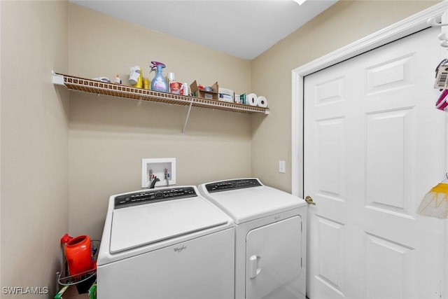 laundry area featuring independent washer and dryer