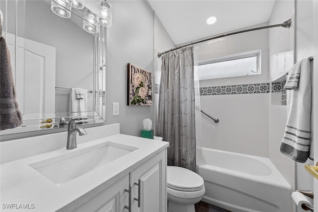 full bathroom with vanity, toilet, and shower / tub combo with curtain