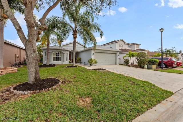 view of front facade featuring a front yard and a garage