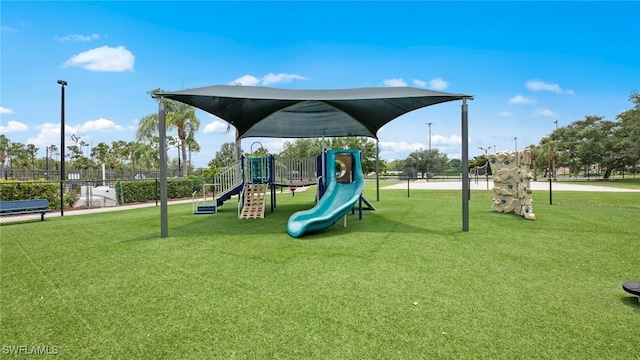 view of playground with a yard