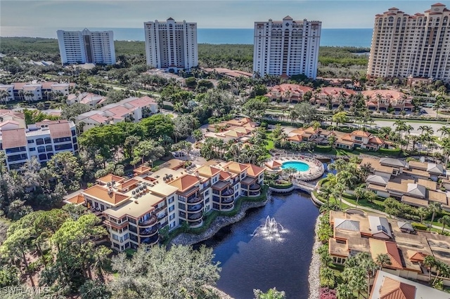 drone / aerial view with a water view