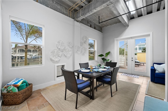 dining space featuring french doors