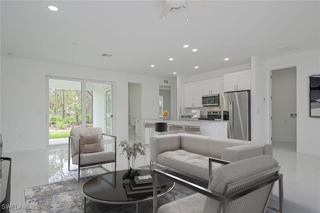 living room featuring light tile patterned floors