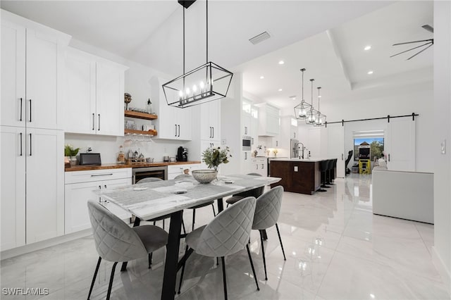 dining room featuring visible vents, beverage cooler, recessed lighting, a notable chandelier, and marble finish floor