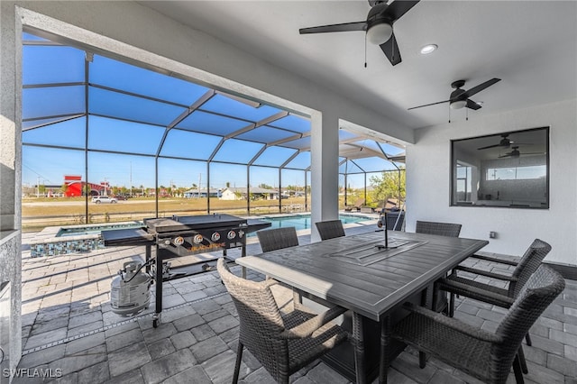 view of patio featuring glass enclosure, outdoor dining area, an outdoor pool, and ceiling fan