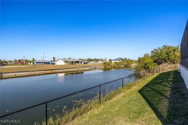 water view featuring fence