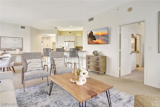 living room with light carpet