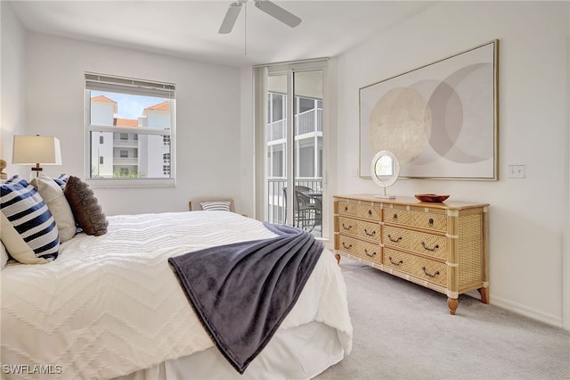 bedroom with ceiling fan, carpet floors, and access to outside