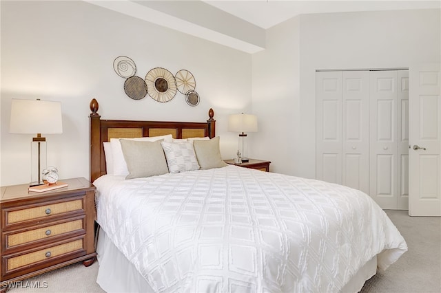 carpeted bedroom featuring a closet