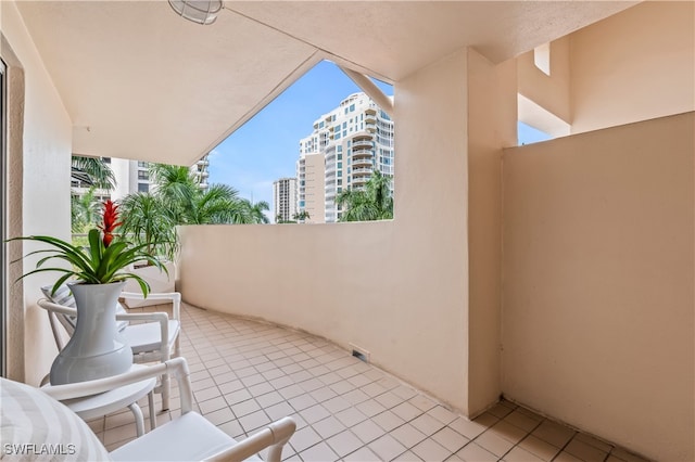 view of patio with a balcony