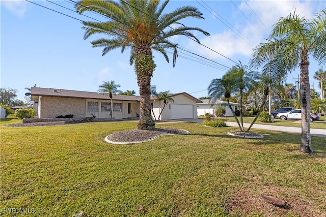 single story home with a garage and a front yard