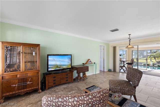 living room featuring crown molding