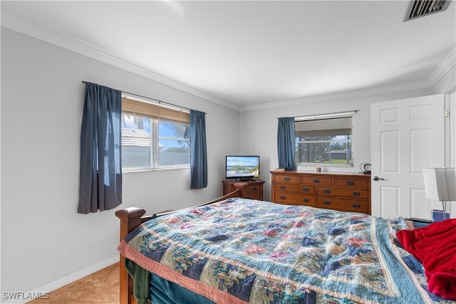 bedroom with ornamental molding