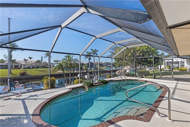 view of swimming pool featuring a patio and glass enclosure