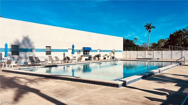 view of pool featuring a patio