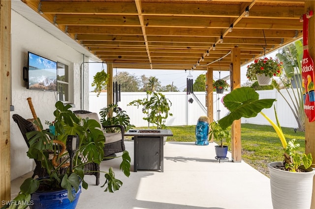 view of patio featuring an outdoor fire pit