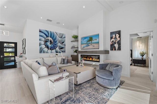 living room featuring vaulted ceiling