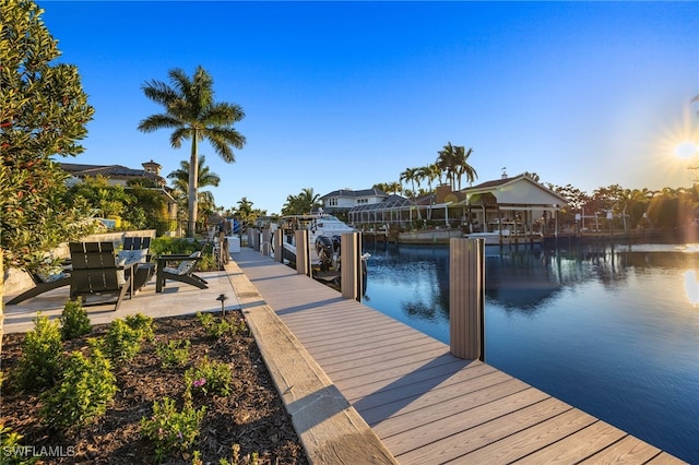 view of dock with a water view