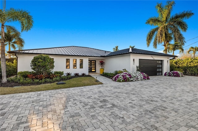 view of front of home with a garage