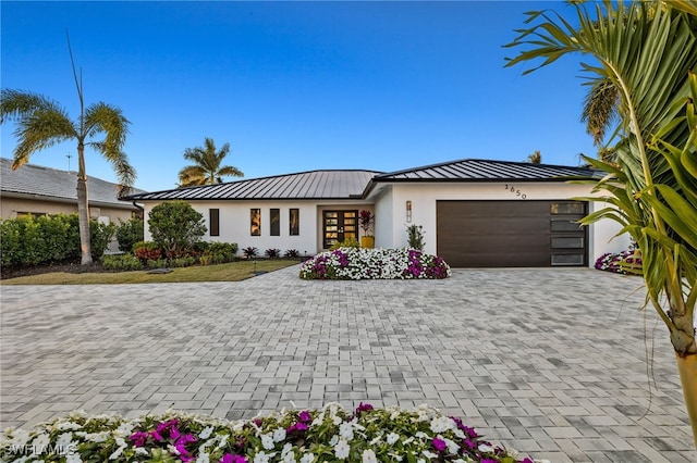 view of front of house with a garage