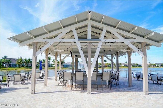 view of community featuring a gazebo and a water view