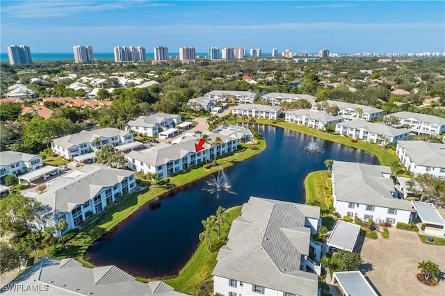 drone / aerial view featuring a water view