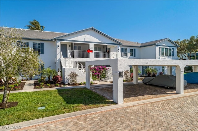 view of property with a front lawn