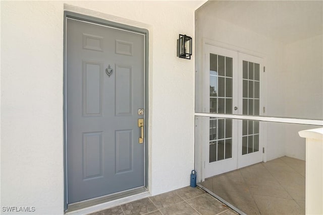 property entrance with french doors