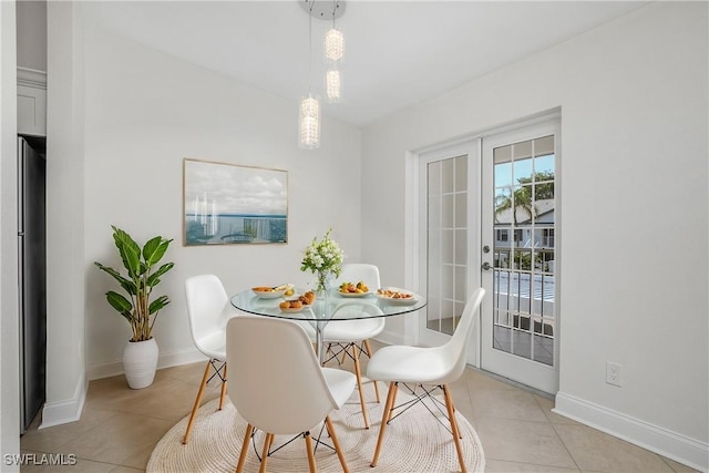 tiled dining room with french doors