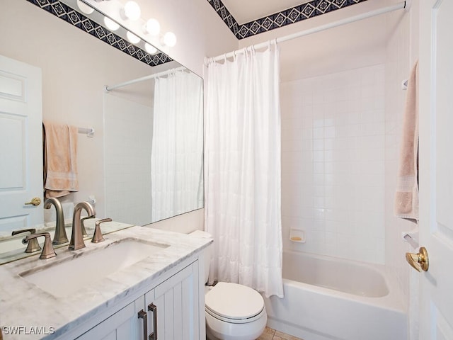 full bathroom featuring shower / bath combo, vanity, and toilet