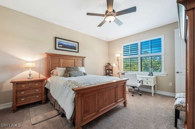 3071 Mandalay Pl, Naples, FL 34105 - bedroom featuring light carpet, a desk, and a ceiling fan