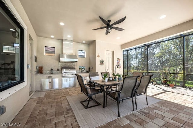 dining room with ceiling fan, a wealth of natural light, and recessed lighting