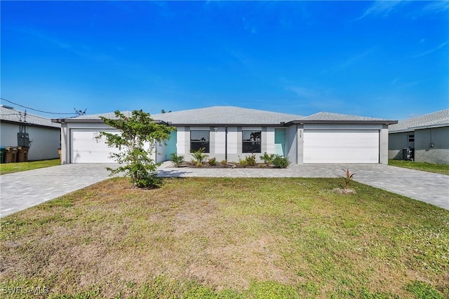 ranch-style house with a garage and a front lawn