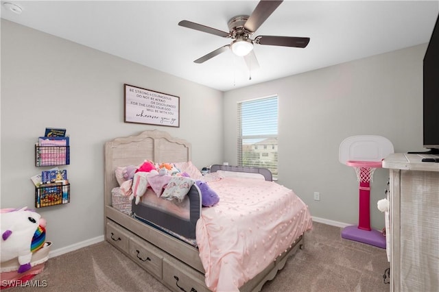 bedroom with ceiling fan and light carpet