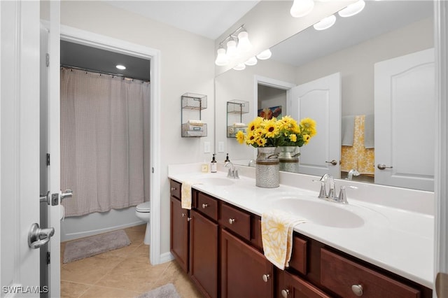 full bathroom featuring tile patterned flooring, vanity, toilet, and shower / tub combo with curtain