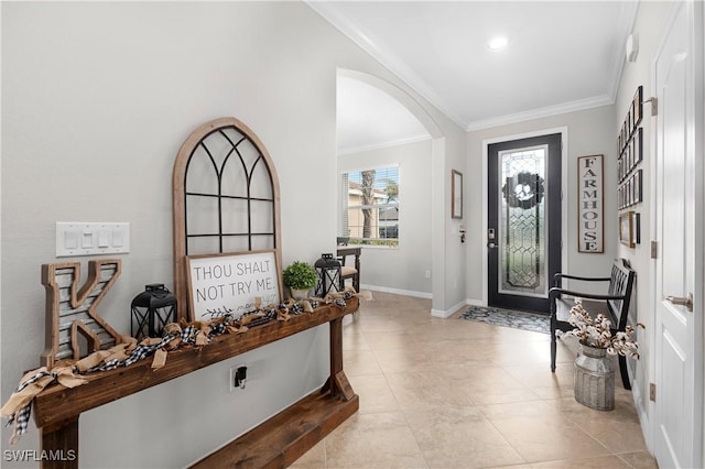 entrance foyer featuring light tile patterned flooring and ornamental molding