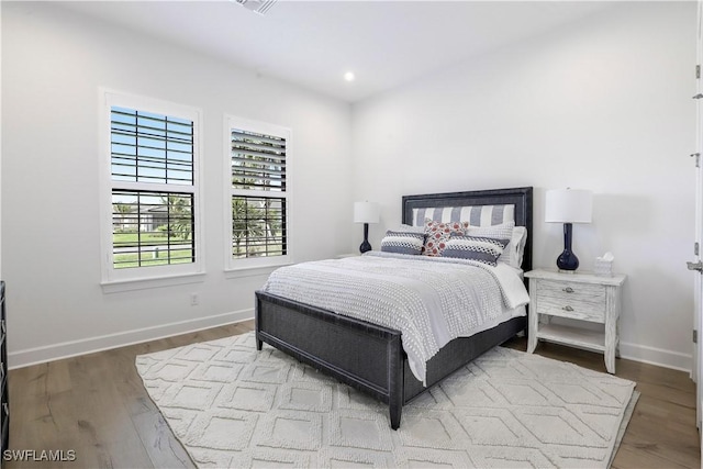 bedroom featuring light wood-type flooring