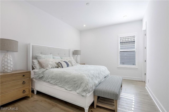 bedroom featuring hardwood / wood-style floors