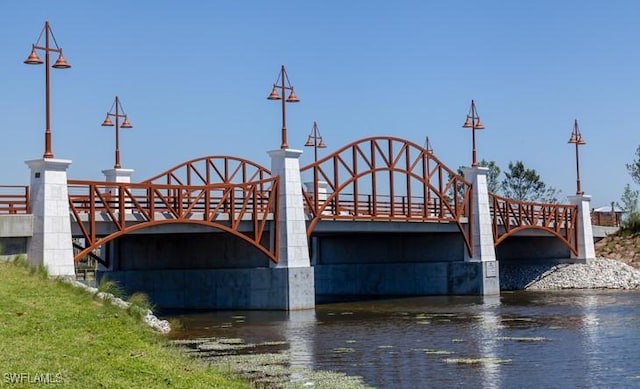 view of gate with a water view