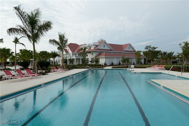 view of pool featuring a patio