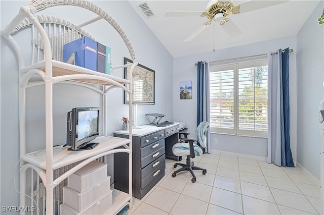 office space with ceiling fan, light tile patterned flooring, and vaulted ceiling