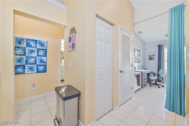 hallway with light tile patterned flooring