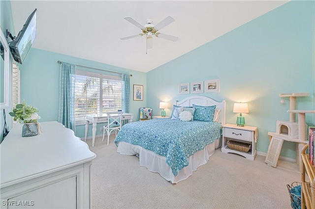 bedroom featuring light colored carpet, ceiling fan, and lofted ceiling