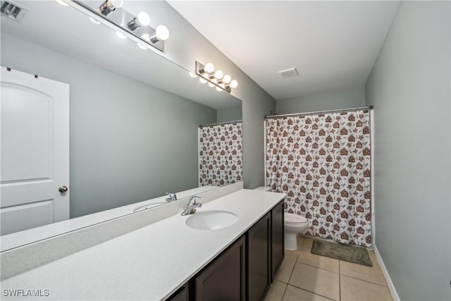 bathroom with tile patterned flooring, vanity, toilet, and a shower with shower curtain