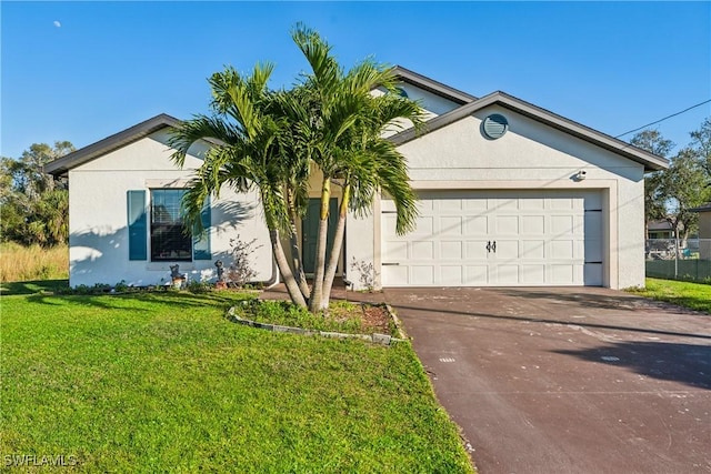 ranch-style house with a front yard and a garage