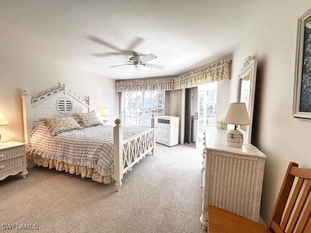 bedroom featuring ceiling fan, light carpet, and access to outside