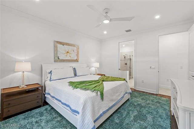 bedroom featuring ensuite bathroom, crown molding, ceiling fan, and dark wood-type flooring