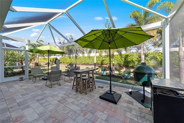 view of patio / terrace with glass enclosure