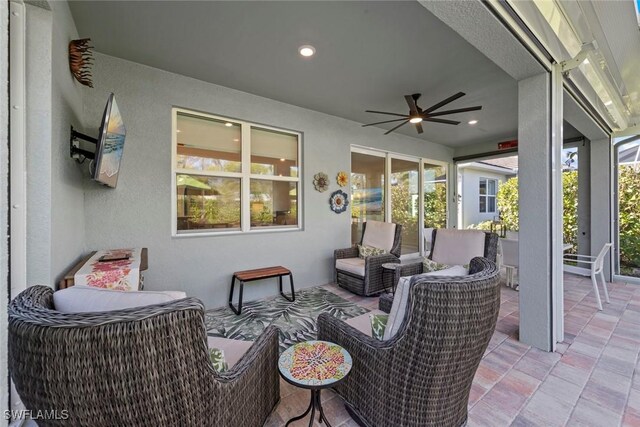 view of patio with ceiling fan