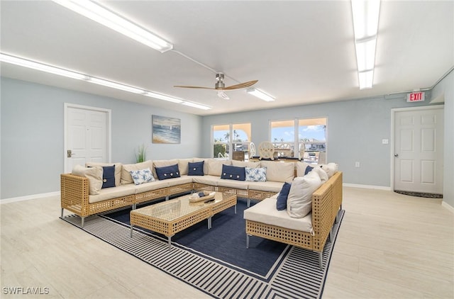 living room with ceiling fan